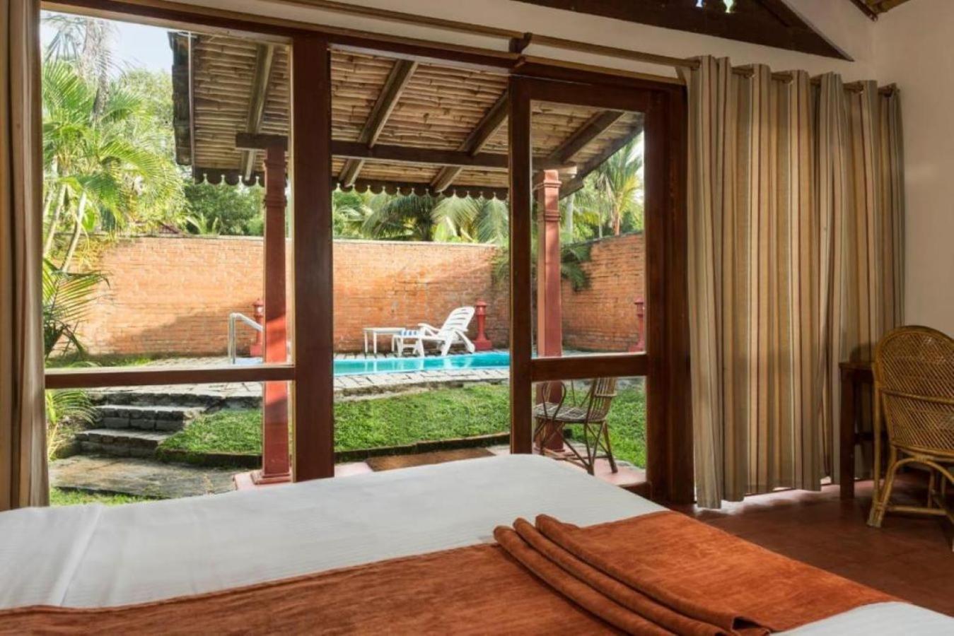 Abad Whispering Palms Hotell Kumarakom Eksteriør bilde