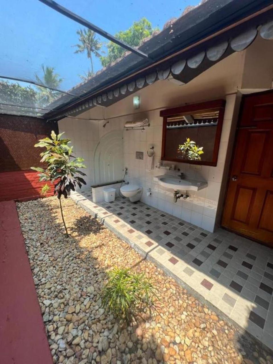Abad Whispering Palms Hotell Kumarakom Eksteriør bilde
